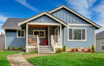 A cozy blue house in a residential area - Insect IQ pest control in Modesto, CA